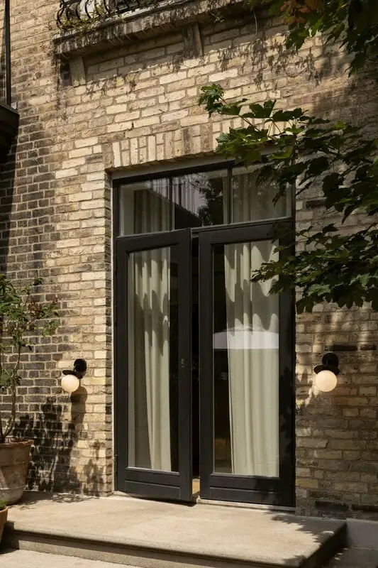 Nuura Liila Outdoor Wall Lamp, Black - Opal White 8 Nuura Liila Outdoor Wall Lamp, Black - Opal White - Image 6